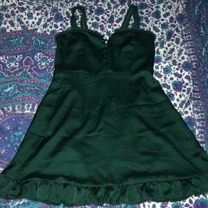 Satin green mini dress.